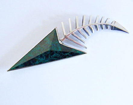 chrsocollar and silver brooch